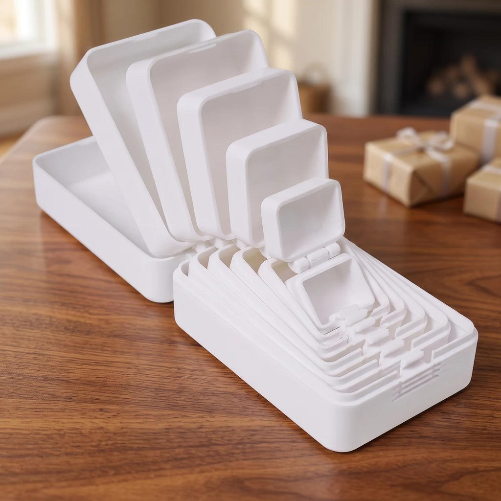 Open White nesting prank box on a coffee table; props are not included